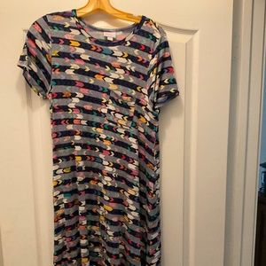 Small Carly Aztec Design with pocket. Very soft teeshirt like material.